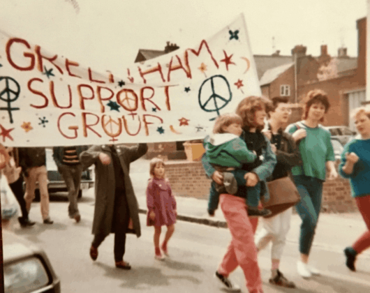 Mothers and children marching in support of the Greenham Common Peace Camp